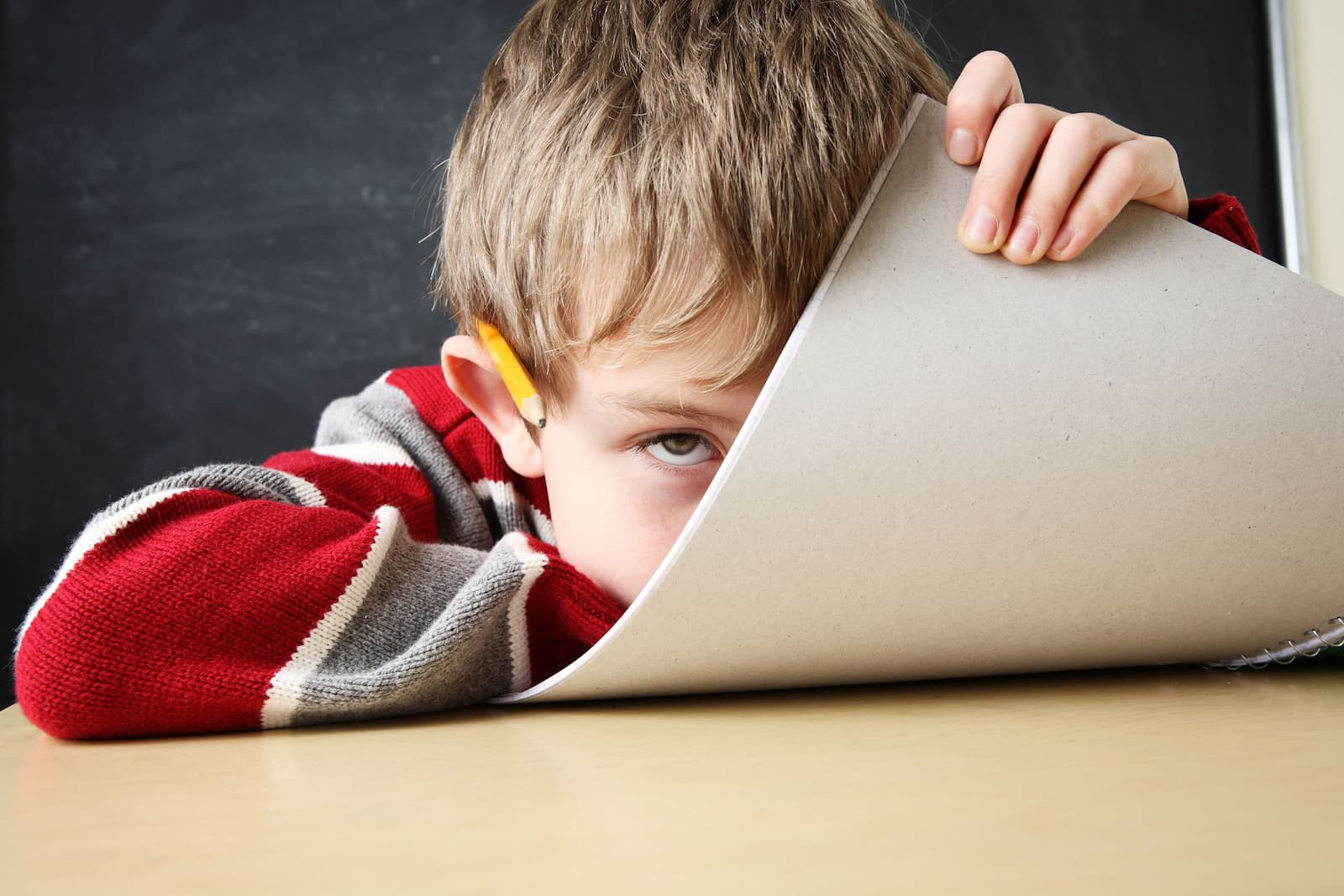 Parent and teenager attending a calm remote consultation from home